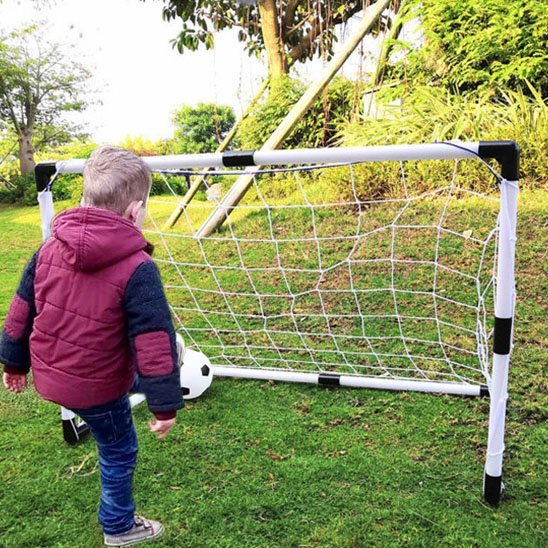 Enfant marque un but dans cage de foot | Goalino-Foot-Kids - Foot Expert