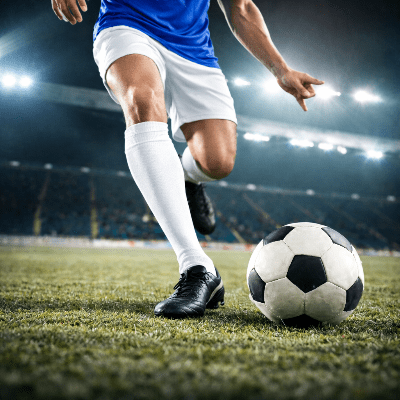 Joueur professionnel porte chaussure foot synthetique 